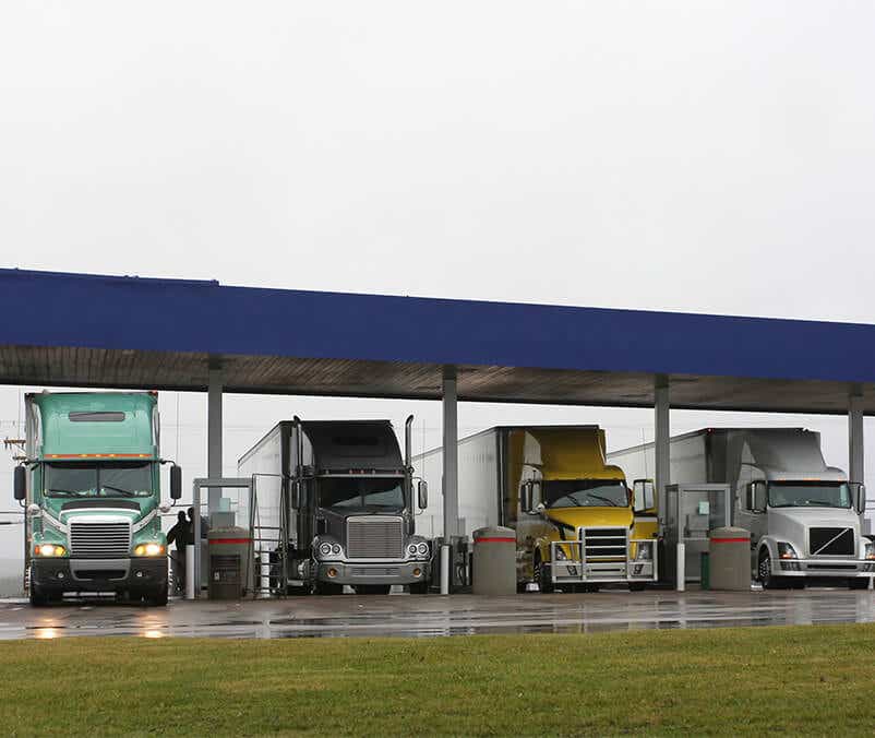 image of row of tractor trailers