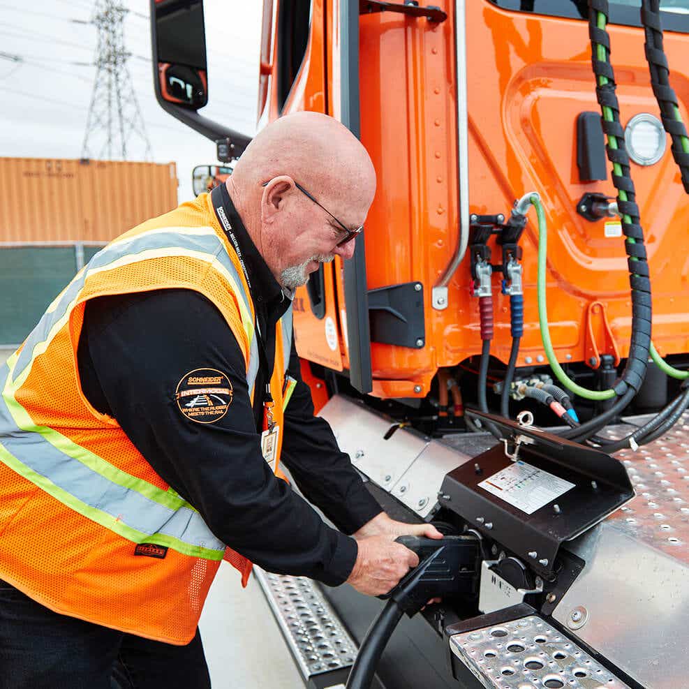 Electric truck being charged