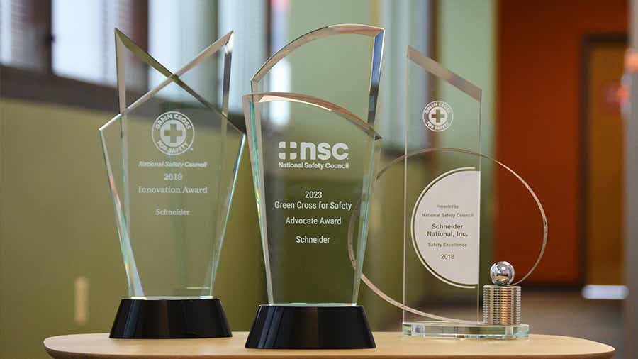 Schneider has won all three awards given out by the National Safety Council and Green Cross for